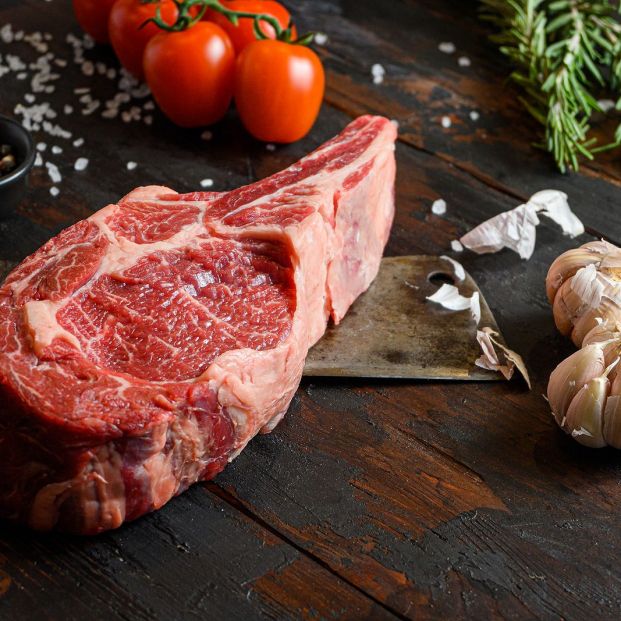 bigstock-raw-cowboy-steak-on-dark-woode-368187421_1_621x621