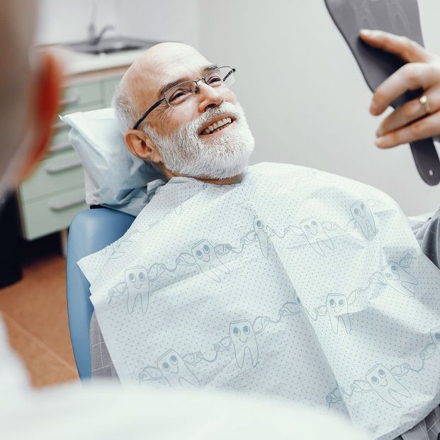 bigstock-old-man-sitting-in-the-dentist-322243741_1_621x621