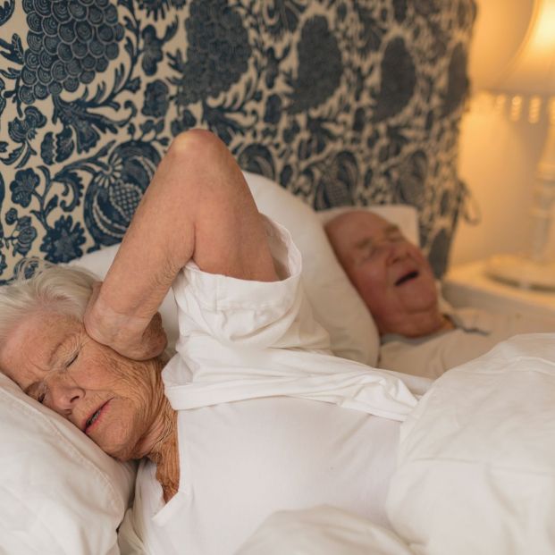 bigstock-senior-woman-covering-ears-whi-348609757_1_621x621