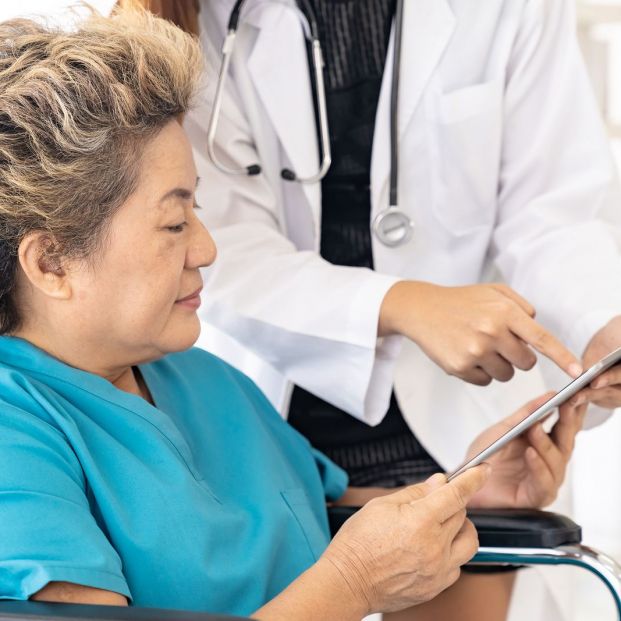 bigstock-asian-confidence-doctor-using-336065563_1_621x621