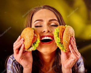 depositphotos_101862738-stock-photo-girl-keeps-and-eating-several
