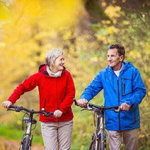 bigstock-active-seniors-walking-with-bi-80608862_1_621x621