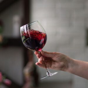 bigstock-hand-sommelier-holding-glass-o-317761534_1_621x621