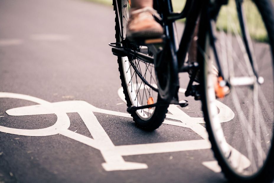 bigstock-city-bicycle-riding-on-bike-pa-105394832_6_928x621