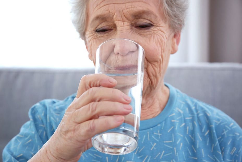 bigstock-elderly-woman-drinking-water-a-192363829_6_928x621